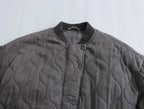 Locker geschnittene graue Damen-Steppjacke
